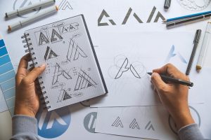 A graphic designer sketching