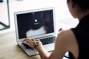 A woman working on a laptop