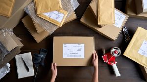 Packages and envelopes on a shipping table