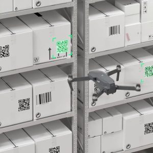 A drone scanning a box in a warehouse