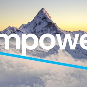 The word "Empower" with mountains in the background