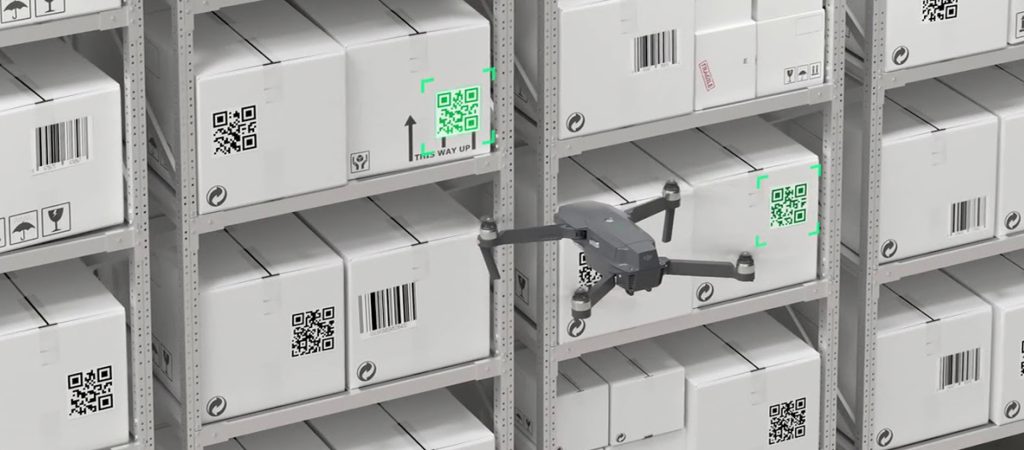 A drone scanning a box in a warehouse